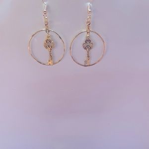 You hold the key to someone’s heart with these cute hoop earrings !